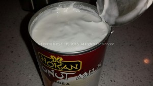 Just scoop the cream out of the top and discard the rest.