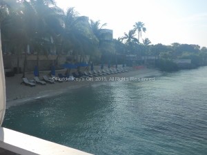 View of the beach from the restaurant (where the Clearly Miserable Dude was eating when he decided to accost us instead.)