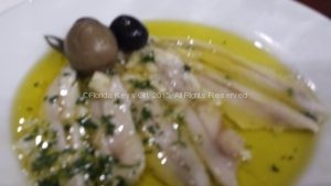 Fresh anchovies cured in olive oil.