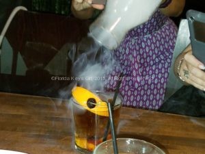 Crafty, smoking cocktails available from the extensive bar menu.