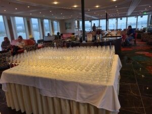 Picture of two hundred or more glasses lined up for a wine tasting